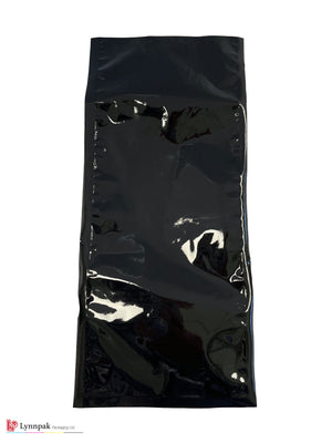 Vacuum food bag, one side clear, one side black, sized 5.75"x13", back view